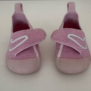 Nike swoosh 1 flying